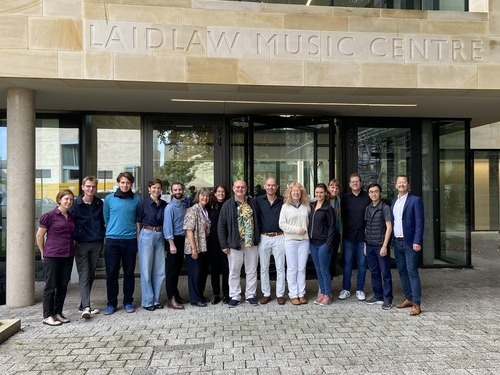 a group of conductors and coaches outside the Laidlaw Music Centre